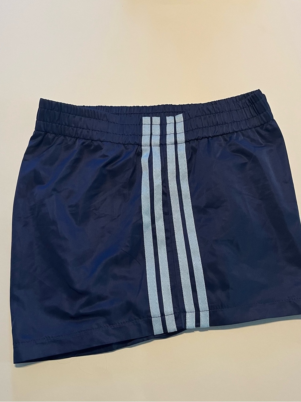 Edikted Navy Athletic Shorts with Light Blue Stripe Detail